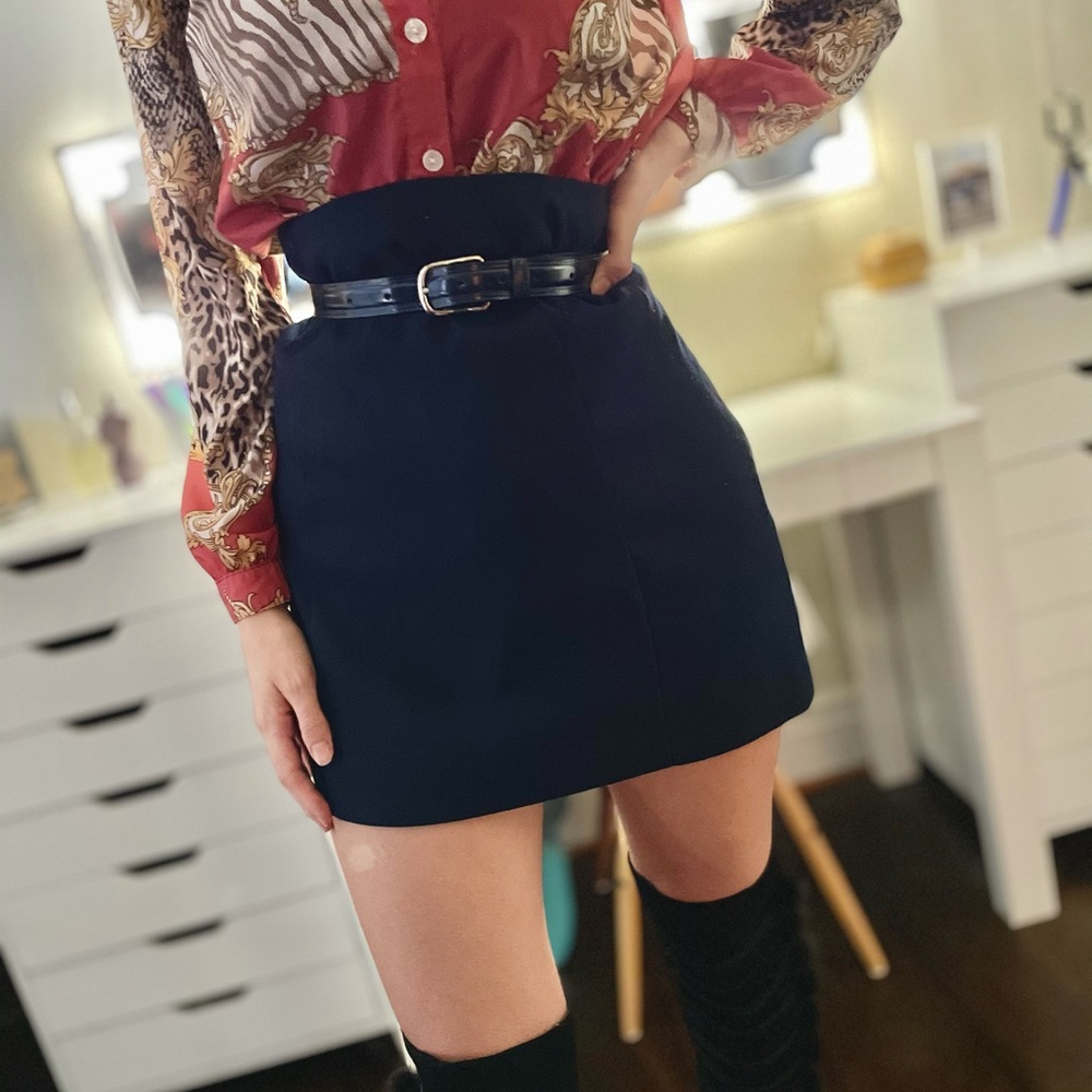 Navy blue, above knee, accent zipper, classy skirt.
